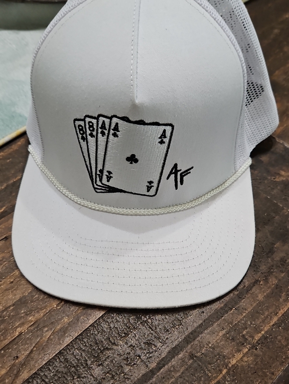 Deadmans Hand White Trucker Hat with Playing Cards Graphic